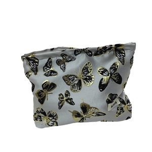Portable butterfly print makeup bag with zipper closure and metallic finish on white background