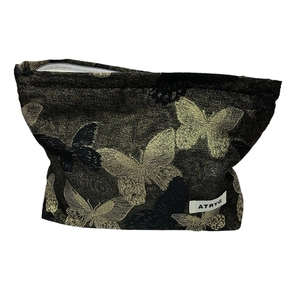 Large capacity black jacquard makeup bag with golden butterfly pattern and zipper