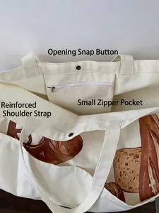 Oversized white canvas tote bag with bread print featuring snap button and inner zipper pocket