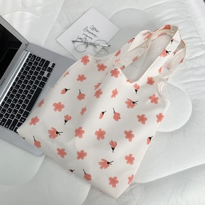 Floral canvas tote bag with pink cherry blossom pattern and large storage capacity