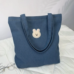Deep blue denim tote bag with cute white plush bunny embroidery for school students