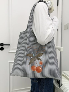Minimalist black and white striped canvas tote bag with cherry print for daily shopping