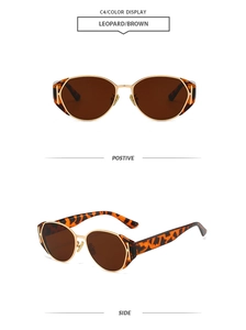 Detail view of oval retro leopard sunglasses with gold H-metal accent and brown lenses