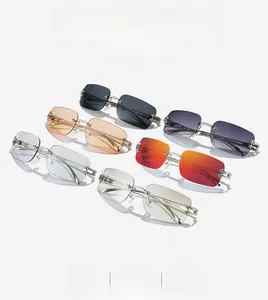 Detail showing six colorful rimless sunglasses with silver star-shaped metal accents