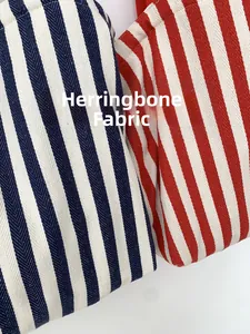 Detail of navy and red striped canvas tote with durable herringbone weave texture
