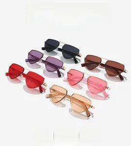 Detail of rimless polygon sunglasses with metallic double bridge and colorful lenses