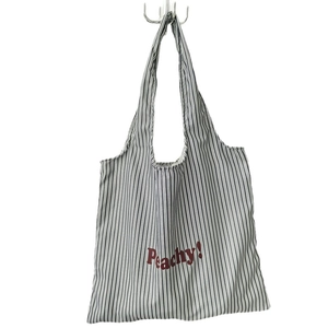 Minimalist striped canvas tote bag with red Peachy! letter print and long shoulder straps
