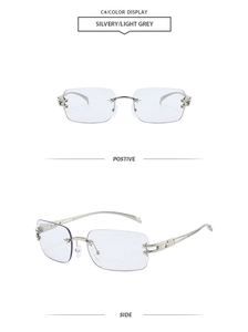 Detail of rimless rectangle sunglasses with star accents and hollow silver metal temples