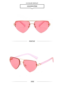 Detail view of pink heart-shaped rimless sunglasses with golden double bridge