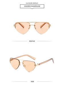 Detail view of rimless metal sunglasses with double bridge and polygon heart-cut lenses