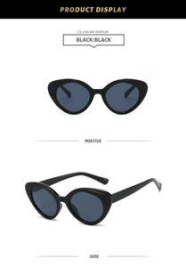 Front and side view of vintage cat-eye sunglasses in black with thick designer frame