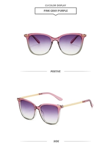 Detail of square purple gradient sunglasses with textured gold metal temples and frames