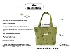 Size chart showing green corduroy tote bag dimensions and smiley face design detail