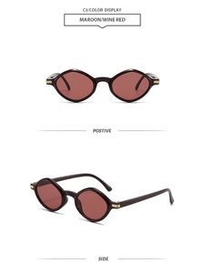 Detail view of wine red geometric sunglasses featuring golden hinges and stylish frame
