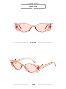 Detailansicht der rosa Fledermaus-Sonnenbrille mit stilvoll gezackten Flügelrahmen