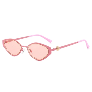 Pink geometric cat-eye sunglasses with gold rose hinges and polygonal metal frames