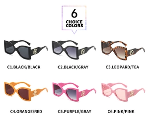 Collection of six retro oversized sunglasses in various colors with golden temple logo