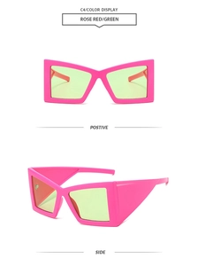 Détail macro de lunettes de soleil rose rouge surdimensionnées aux verres verts