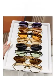 Detailed top view of minimalist oval metal frame sunglasses in eight vibrant lens colors
