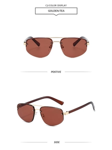 Close-up of golden rimless aviator sunglasses with brown gradient lenses and dual bridge