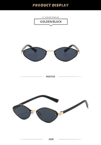 Detail view of gold metal frame and black diamond lenses on stylish sunglasses