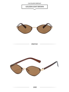 Close-up of golden metal frame sunglasses with light brown lenses in diamond shape