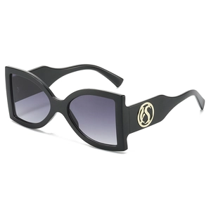 Black square oversized sunglasses with purple gradient lenses and gold temple detail