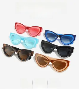 Collection of retro cat eye sunglasses in six vibrant colors with thick resin frames