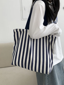 Large capacity navy striped canvas tote bag with wide shoulder straps for women