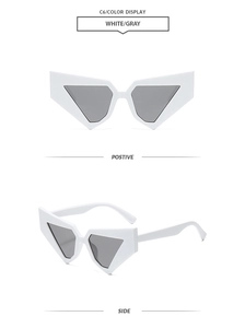Detail view of bold white geometric triangle sunglasses with dark grey lenses in C6 style
