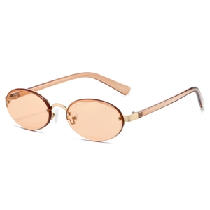 Retro oval rimless sunglasses with amber lenses and transparent pink temples at 45 degree angle
