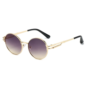 Lunettes de soleil rétro punk monture ronde dorée avec charnières ressort et verres dégradés