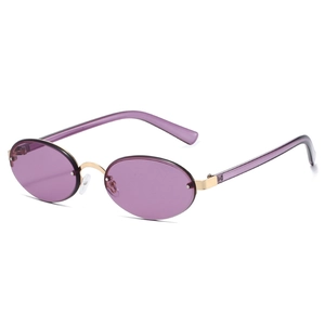 Fashionable oval rimless sunglasses with purple lenses and gold metal frame from side view