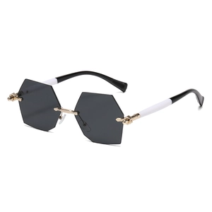 Modische randlose Sechseck-Sonnenbrille mit goldenem Steg und zweifarbigen Bügeln