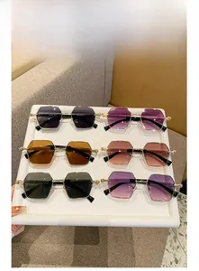 Detail shot of hexagonal metal sunglasses in six different stylish color variations