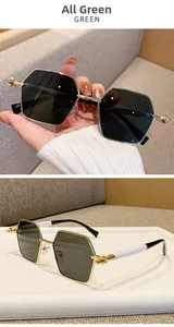 Detailed side view of metal square sunglasses with green lenses and bicolor temples