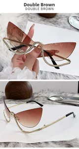 Gros plan sur des lunettes de soleil œil-de-chat sans monture avec strass et verres dégradés marron