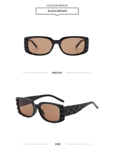 Detaillierte 3D-Geometrie-Textur auf schwarzer quadratischer Sonnenbrille mit braunen Gläsern