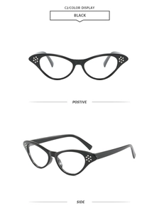Detail of black cat-eye sunglasses featuring rhinestones and vintage frames