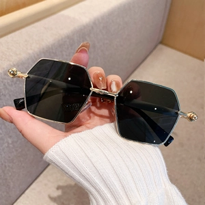 Classic square metal sunglasses with gold hexagonal frame and dark black lenses