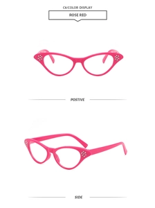 Detail view of rose red cat eye sunglasses with diamond decorations on the frame