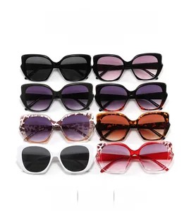 Detail view showing eight color variants of trendy cat-eye oversized fashion sunglasses