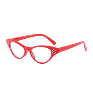 Red cat eye sunglasses with rhinestone accents in a vintage minimalist design