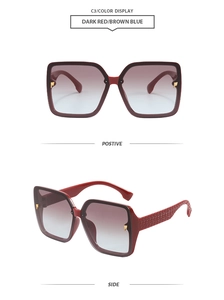 Detail showing dark red square frames and textured temples on gradient lens sunglasses