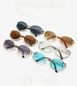Detail showing various lens colors and heart-shaped cutout decoration on sunglasses