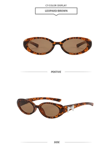 Détails de lunettes de soleil ovales léopard avec un nœud métallique argenté sur la branche