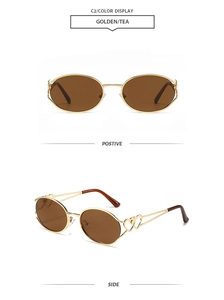 Detail of Y2K oval sunglasses featuring hollow heart motifs on golden metal temples