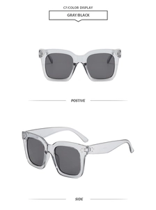 Détails de lunettes de soleil carrées grises avec rivets argentés et verres polarisés