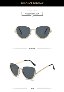 Vue détaillée de lunettes de soleil œil de chat dorées avec monture sertie de perles