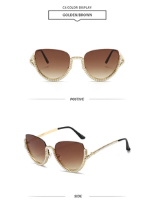 Détails de lunettes œil-de-chat dorées avec verres dégradés marron et perles décoratives